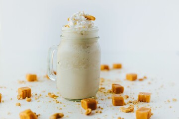 Closeup shot of refreshing caramel milkshake