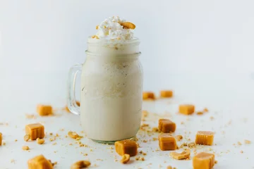  Closeup shot of refreshing caramel milkshake © Jeffrey Bethers/Wirestock Creators