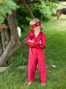 young girl in devil costume