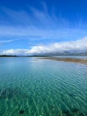 azure transparent sea water, sea view with mountains background