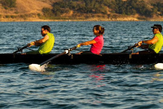 Men and women of the Lake Casitas Rowing Team work on some drills at Lake Casitas in Ojai, California.