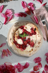 Sweet Neapolitan pizza with raspberries
