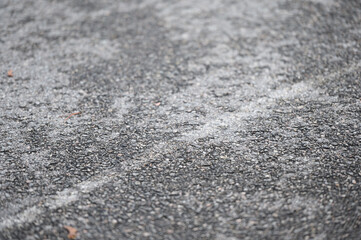 Blurred cement background, selective focus, abstract grey outdoor surface