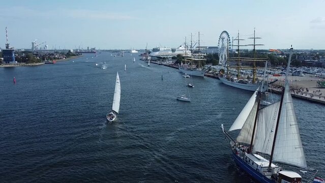 Sailing boats during HanseSail 2022 in Rostock / Warnem&uuml;nde - Drone Aerial footage