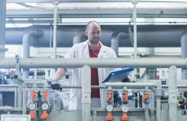 Male engineer working in industry, Hanover, Lower Saxony, Germany