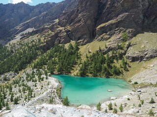 Naklejka premium Aerial shot of the blue lake in Aosta valley, Champoluc, Italy - Lago Blu