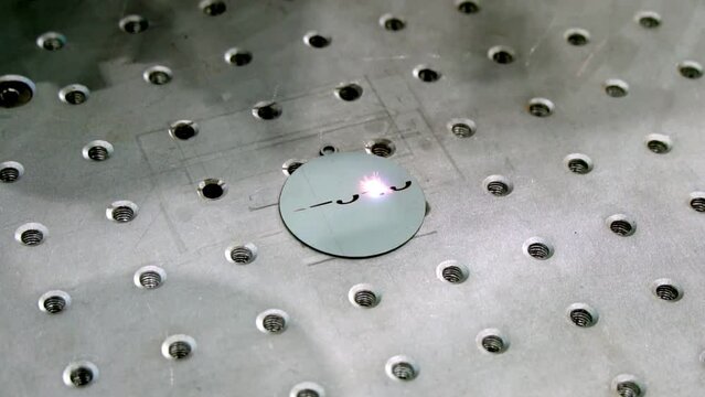 Industrial production of engraving with a modern laser. additive manufacturing metal printer printing model - close up view, slow motion. Prototyping, metalworking, engraving, futuristic, 