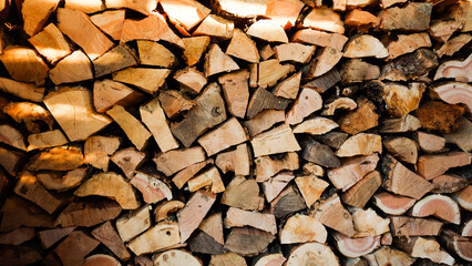 Chopped firewood, preparation for the cold, fuel for the stove, a pile of firewood