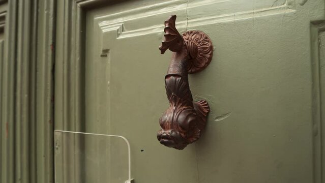 Forged door handle. Door decor door handle. Salvador Dali Museum in Figueres, Spain. The Dali Theater Museum in Figueres. Museum of the surrealist painter Salvador Dali in Figueres, Catalonia.