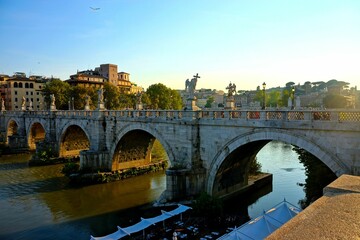 Beautiful ancient St. Angelo Bridge captured on a sunny day in Rome, Italy