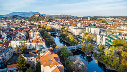 Aerial view of the historic city centre of Graz in Austria with the river Mur, bridges and the...