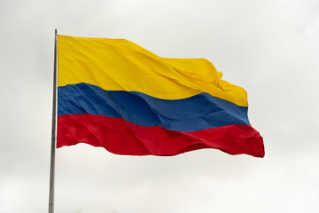 National flag of the Republic of Colombia waving in the wind.