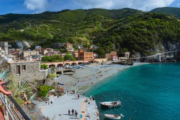 Fototapeten The town of Monterosso, within the Cinque Terre, with its typical streets, beaches and the sea during an Autumn day, Liguria, Italy - October 2022. © Roberto