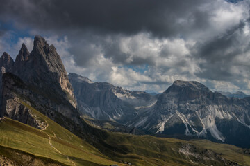 Clouds over mountain massif in Dolomites