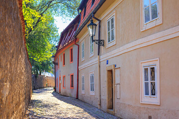 Fototapeta na wymiar Cityscape - view of the narrow streets of the Novy Svet ancient quarter in the Hradcany historical district, Prague, Czech Republic