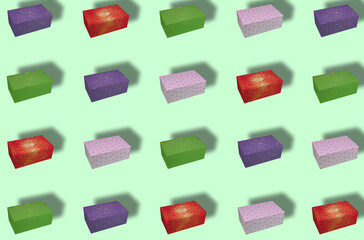 pattern colorful boxes on the pastel green background, creative wrapped boxes in colorful papers with glitter, creative holiday concept
