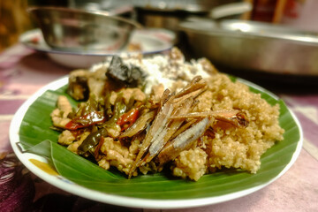 Cassava rice with small fried fish.