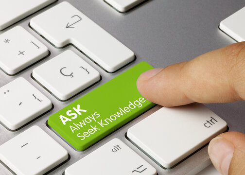 ASK Always Seek Knowledge - Inscription on Blue Keyboard Key..