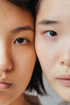 Diverse Asian women looking at camera
