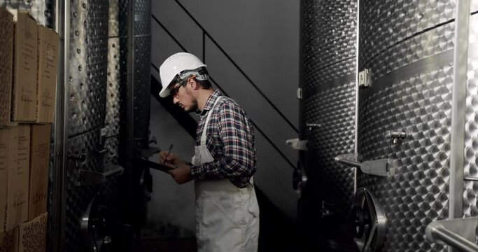 Close-up of a distillery's copper stills gleaming under soft light, symbolizing the meticulous selection and distillation process.