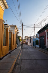 Quiet and colorful desolate urban street in a neighborhood of the Peruvian capital, Lima.