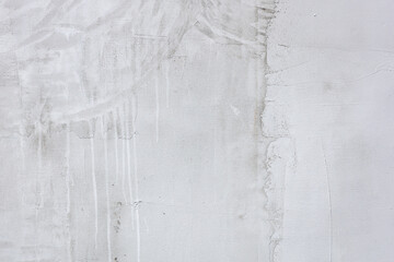 Cement wall background, close-up with spots and transitions