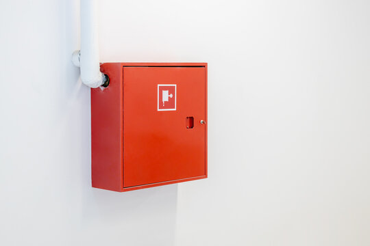 Red Fire Cabinet With Hydrant, On A White Wall, Security System