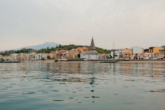 View of picturesque beach town Giardini Naxos in Sicily 