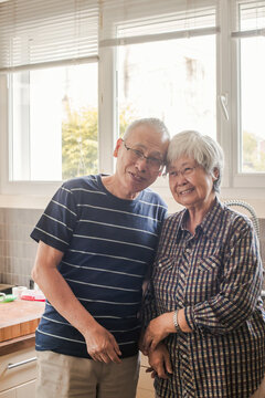 Happy Senior Couple Portrait, Smiling Retired Man And Woman At Home