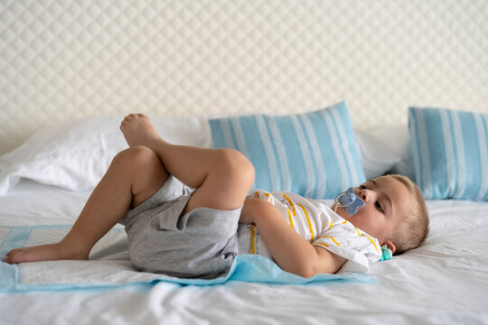 baby lying on the bed