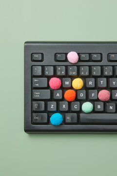Keyboard with soft balls in place of buttons.