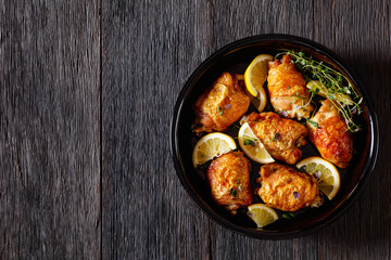 roast chicken thighs with lemon, thyme and spices