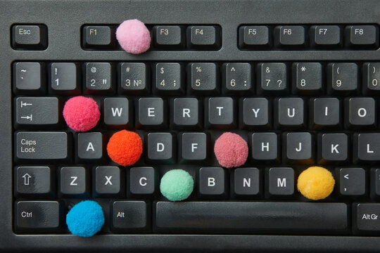 Colorful balls in place of keys in keyboard.