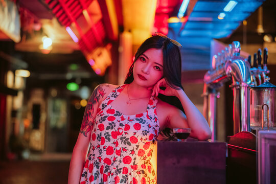 portrait of an Asian woman at night