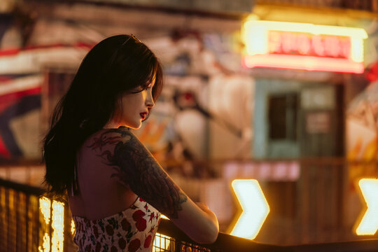 portrait of an Asian woman at night