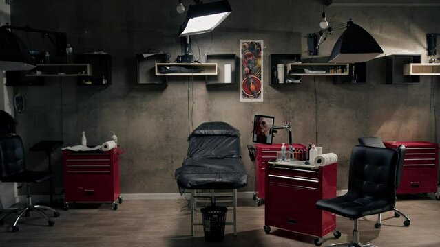 Tattoo studio interior, tattoo equipment, tattooing process