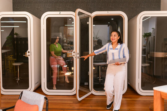 Business women in capsule offices