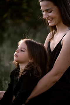Mother and daughter spending time outdoors.