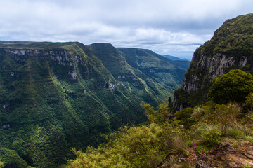 Fototapeta premium Green hills of scenic canyon formation.