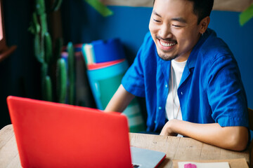 Asian Man Working in Office