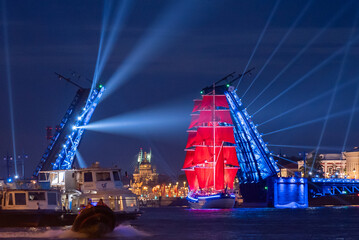 A ship with scarlet sails. Floats along the Neva River in the city of St. Petersburg. A celebration dedicated to school graduates.