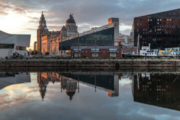 Royal Liver Building and the Museum in Liverpool, image captured at sunset in the city center downtown docklands
