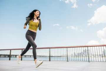 Sportswoman running in the city