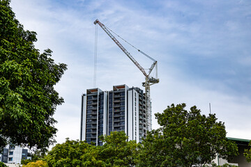 High rise construction with crane