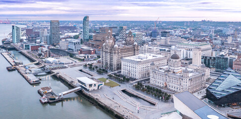 Aerial view Royal Albert Dock in Liverpool docklands in the city center, first rays in the morning