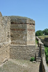 Ruins of the medieval castle wall in Europe in good weather