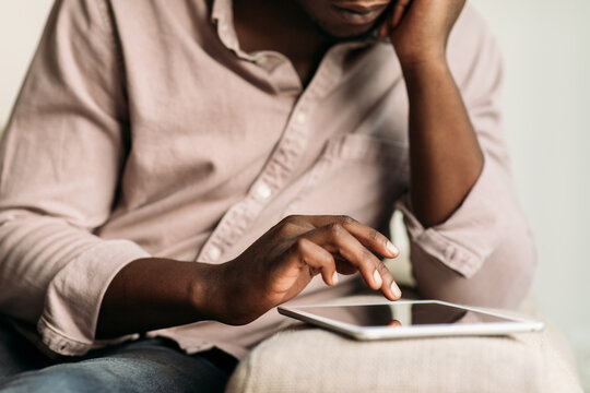 Man Using Digital Tablet