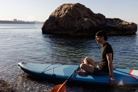 A man floats on a sup