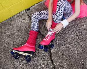 Roller Skater Girl Tying Skates
