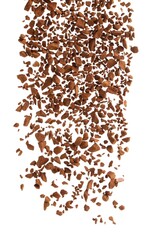 Pouring aromatic instant coffee on white background
